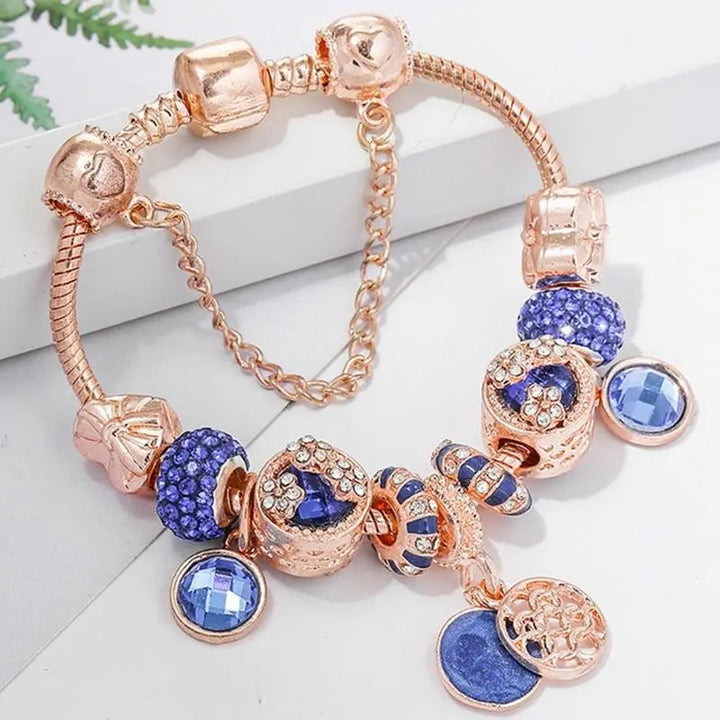 Armband in Rosa Silberfarben mit Blauem Kristall