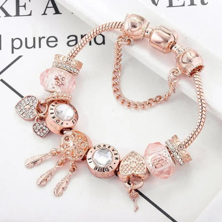 Armband Rosentraumfänger mit Anhängern in Silberfarben inklusive