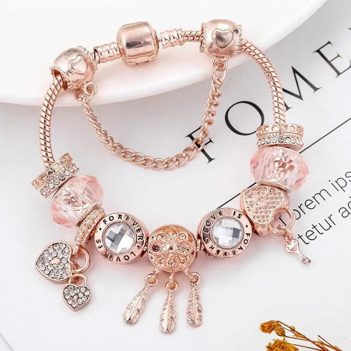 Armband Rosentraumfänger mit Anhängern in Silberfarben inklusive