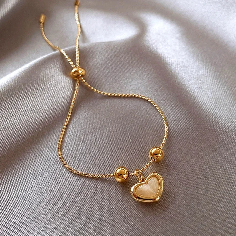 Goldfarbenes Opal Pfirsich Herz Armband