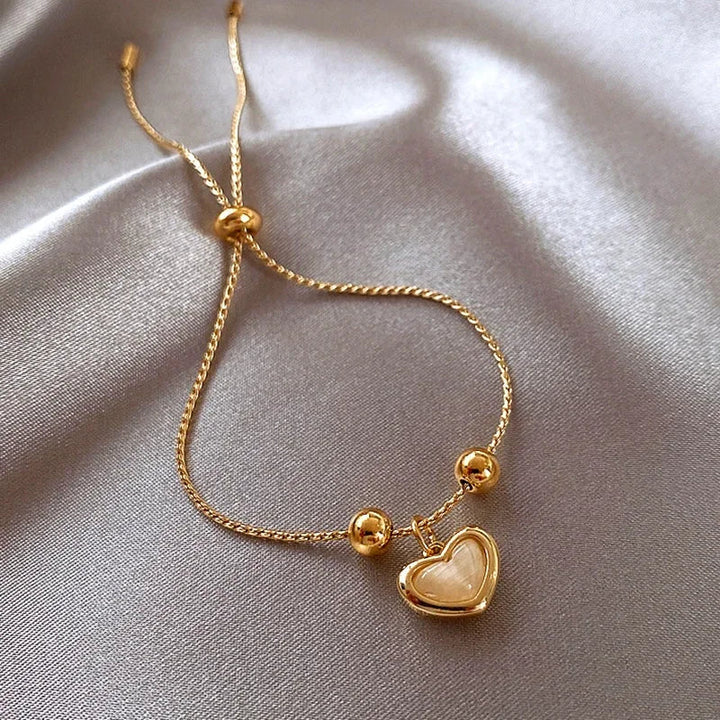 Goldfarbenes Opal Pfirsich Herz Armband